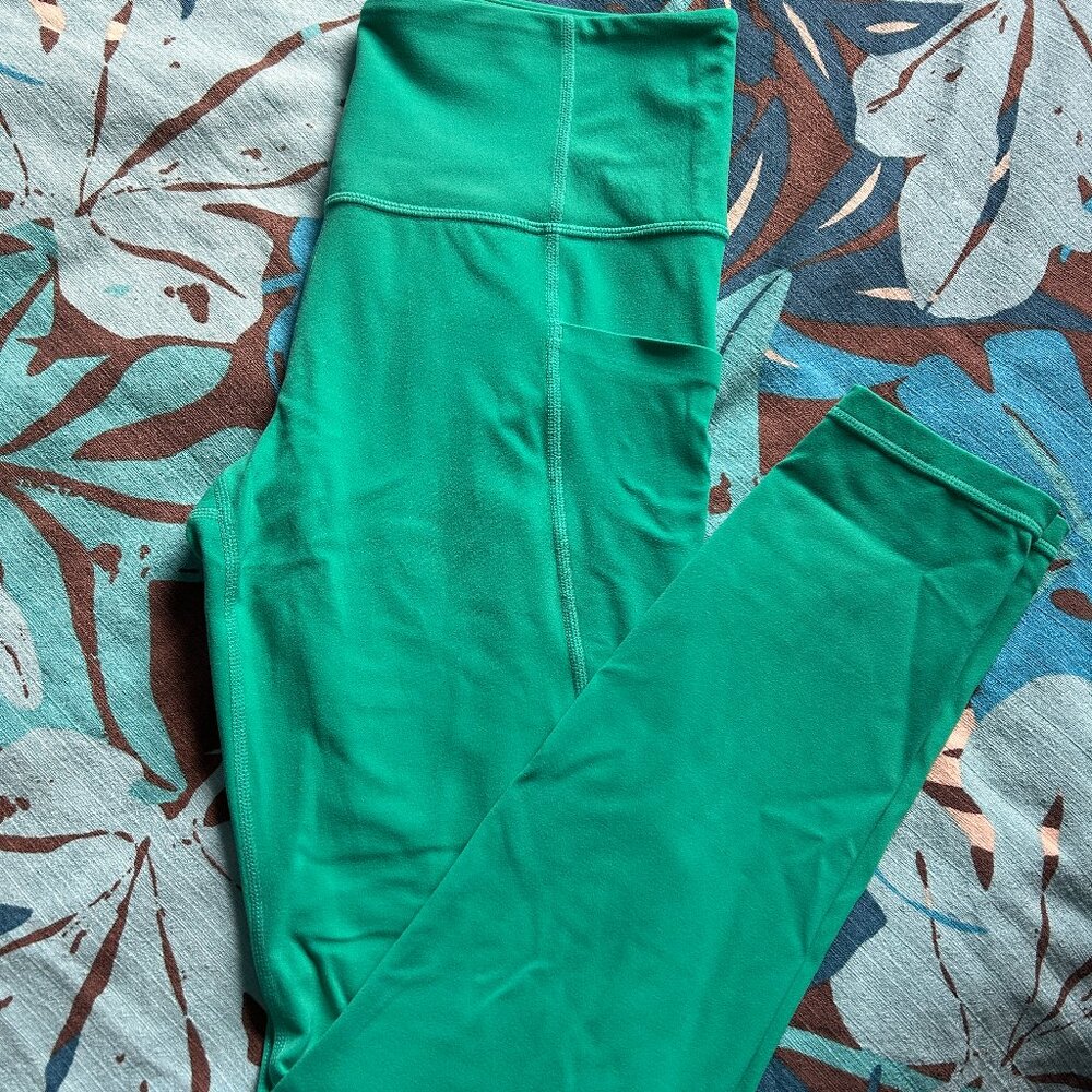 Athleta Salutation Stash Pocket Tigh Legging in Teal Size Medium